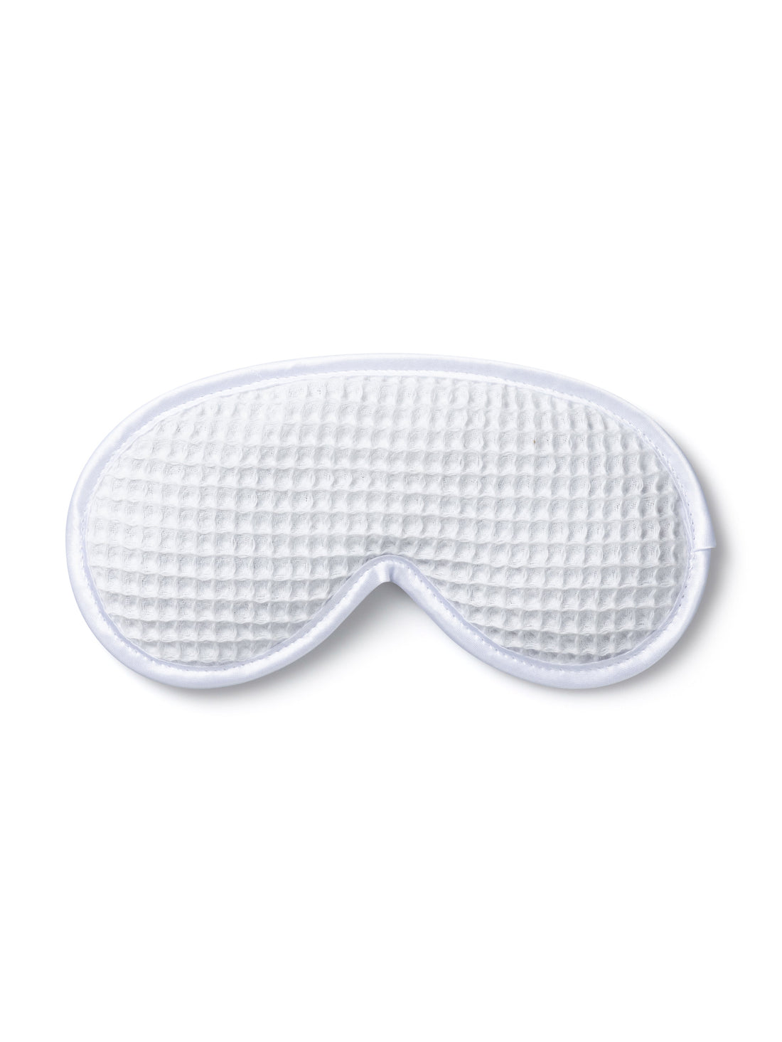 White waffle eye mask filled with lavender, crafted by Chalk for relaxation and restful sleep.