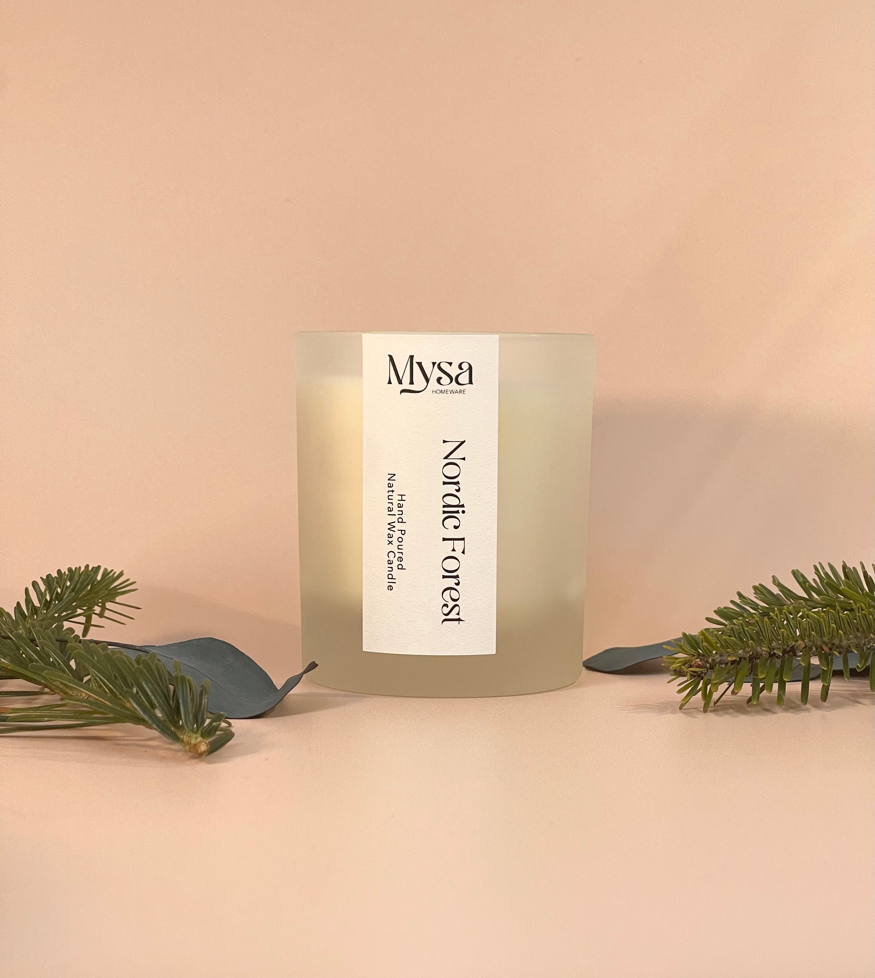 Nordic Forest luxury scented candle crafted from natural wax, featuring a delightful blend of pine and eucalyptus  fragrance.