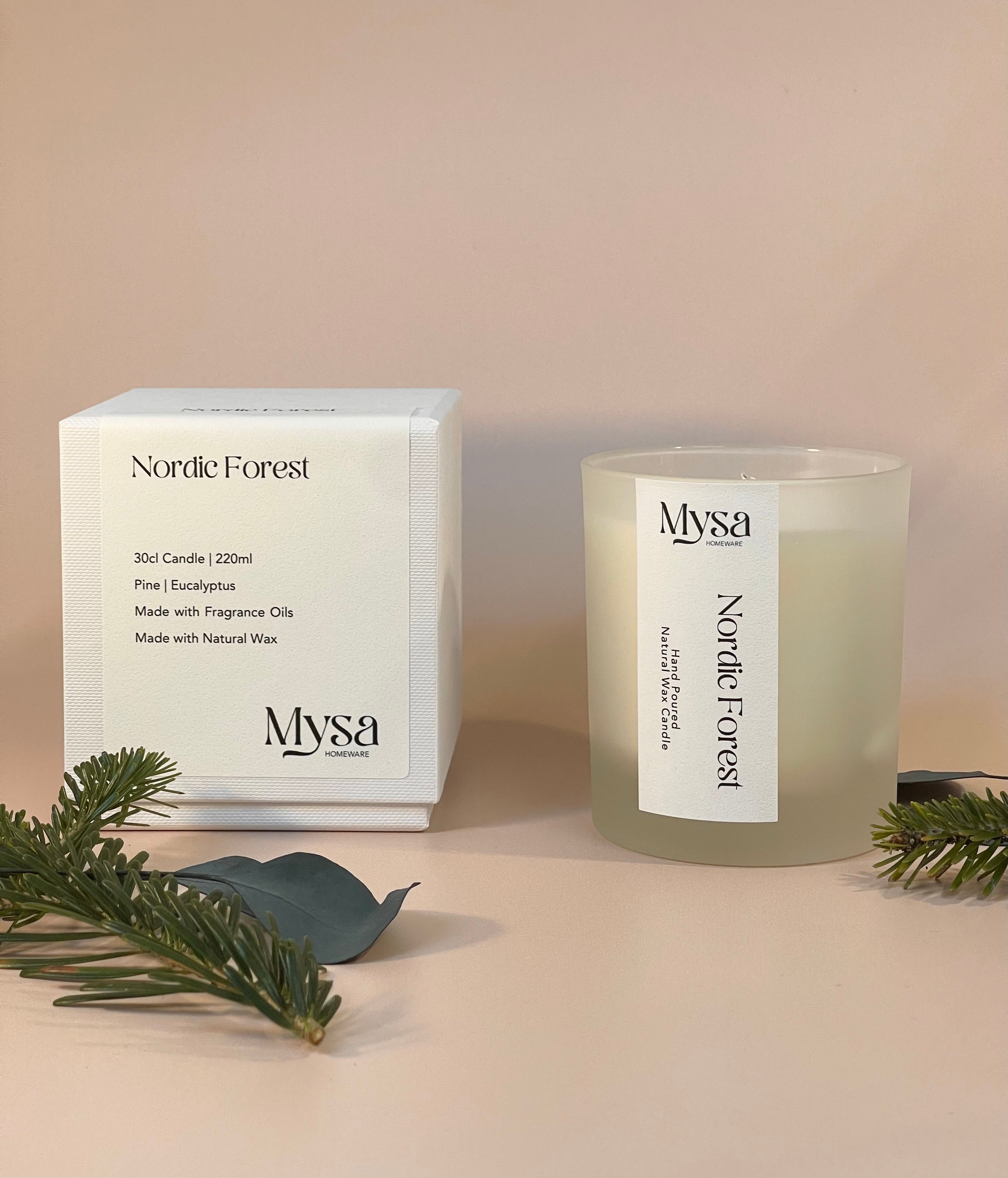 Nordic Forest luxury scented candle crafted from natural wax, featuring a delightful blend of pine and eucalyptus fragrance.