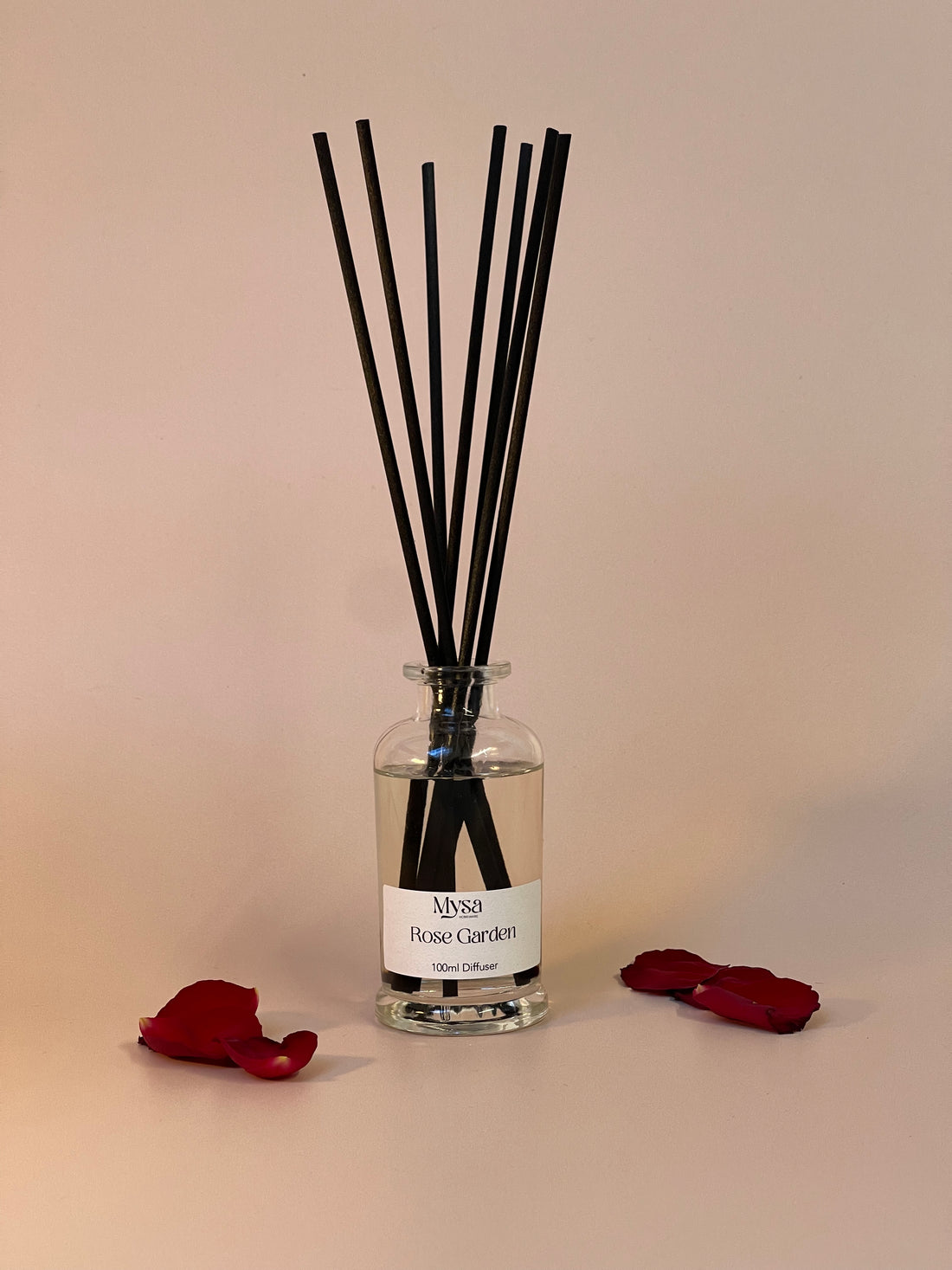 Rose Garden luxury reed diffuser in gift box, featuring a vegan base oil infused with English roses fragrance.