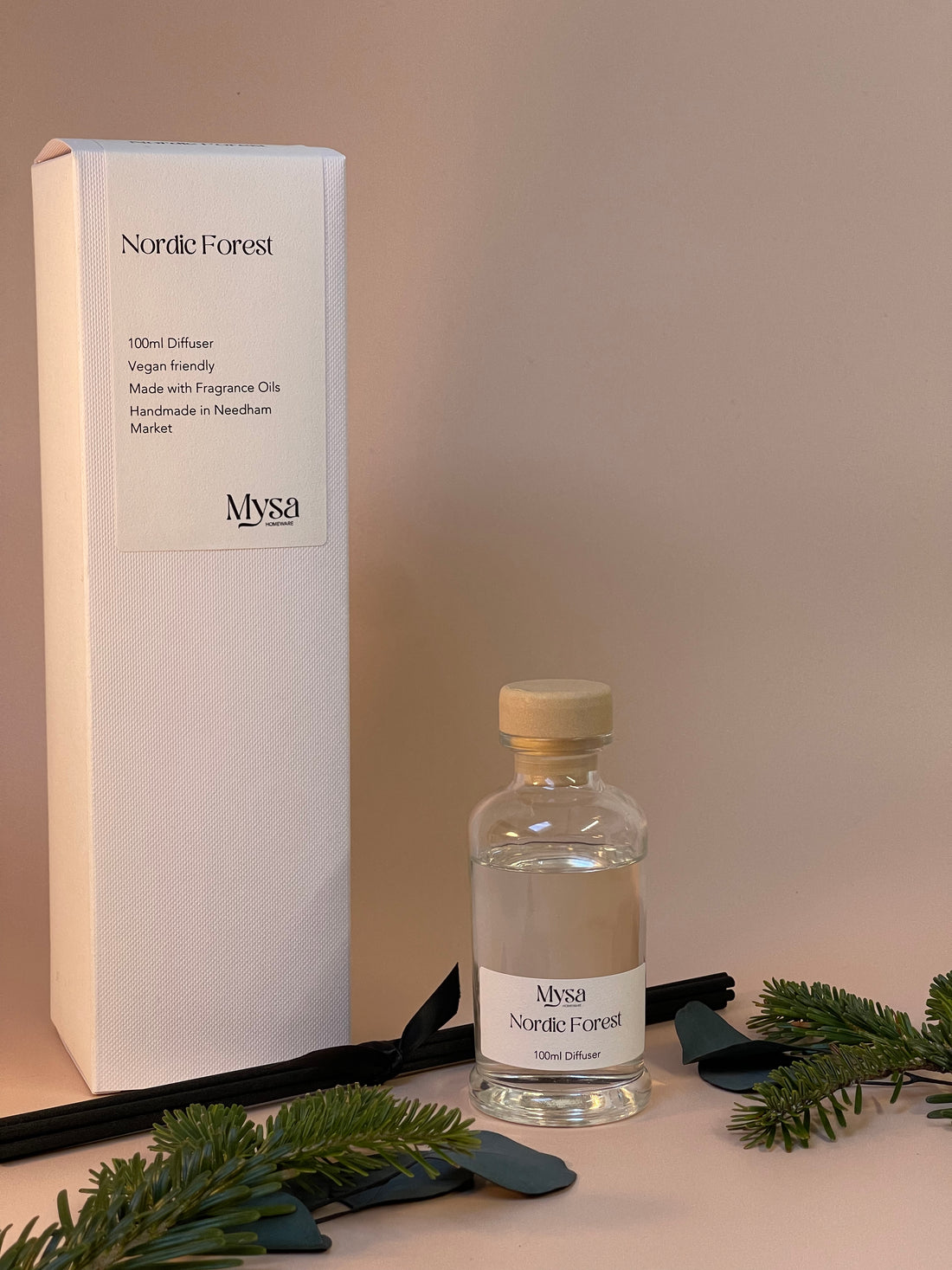 Nordic Forest luxury reed diffuser in gift box, featuring a vegan base oil infused with pine and eucalyptus fragrance.