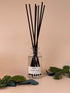 Nordic Forest luxury reed diffuser in gift box, featuring a vegan base oil infused with pine and eucalyptus fragrance.