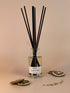 Autumn Dusk luxury reed diffuser in gift box, featuring a vegan base oil infused with frankincense & bergamot fragrance.