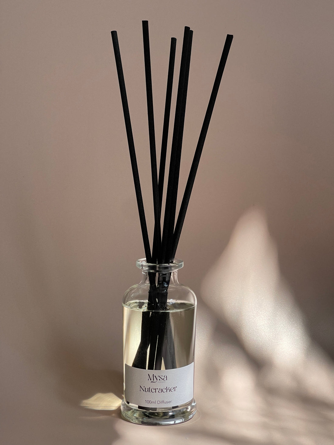 Nutcracker luxury reed diffuser in gift box, featuring a vegan base oil infused with nutcracker fragrance.