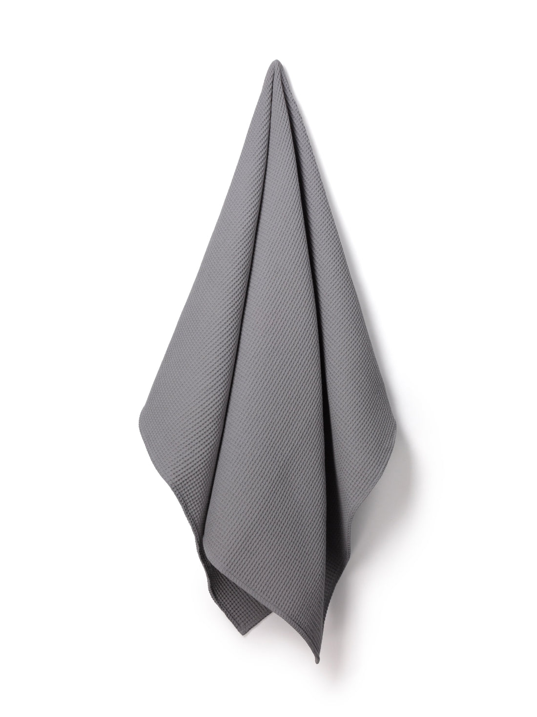 Waffle grey throw blanket by Chalk, offering cozy comfort and stylish texture for your home.
